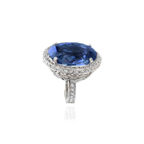 18K White Gold Ring with Blue Sapphire on a Diamond Setting